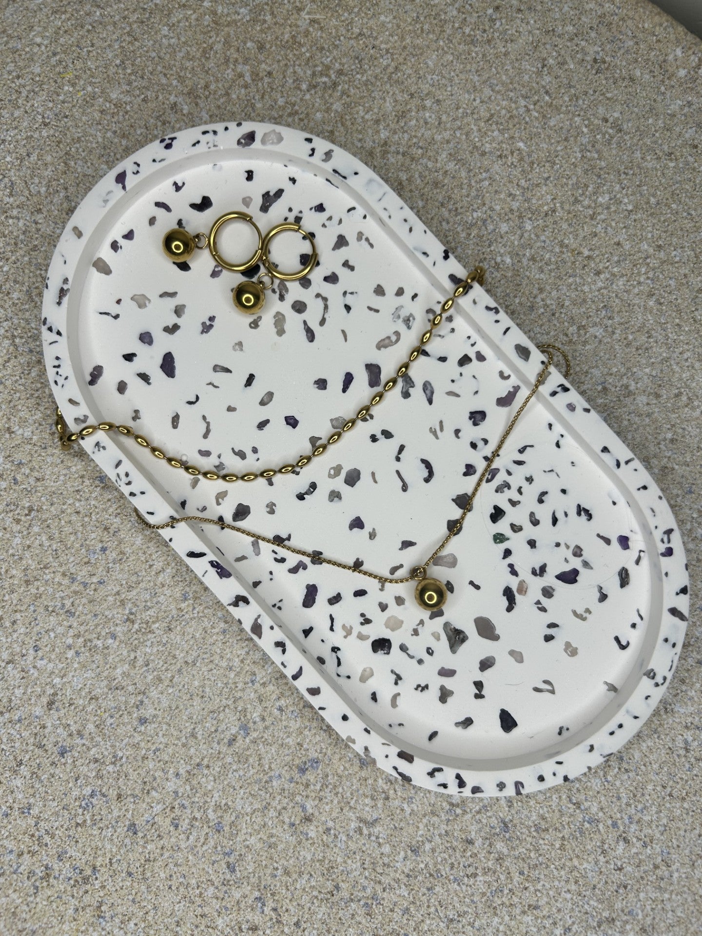 Handmade Home Accessories - a shot of our handmade amethyst trinket tray with gold jewellery on for display