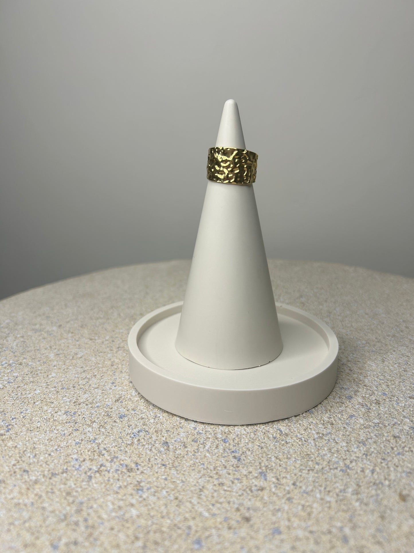 Handmade Home Accessories - a greige ring holder on a trinket dish with a gold chunky ring displayed on it.