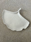 Handmade Home Accessories - A white Ginkgo Leaf trinket tray, showed plain so you can see the intricate details on a stone textured background.