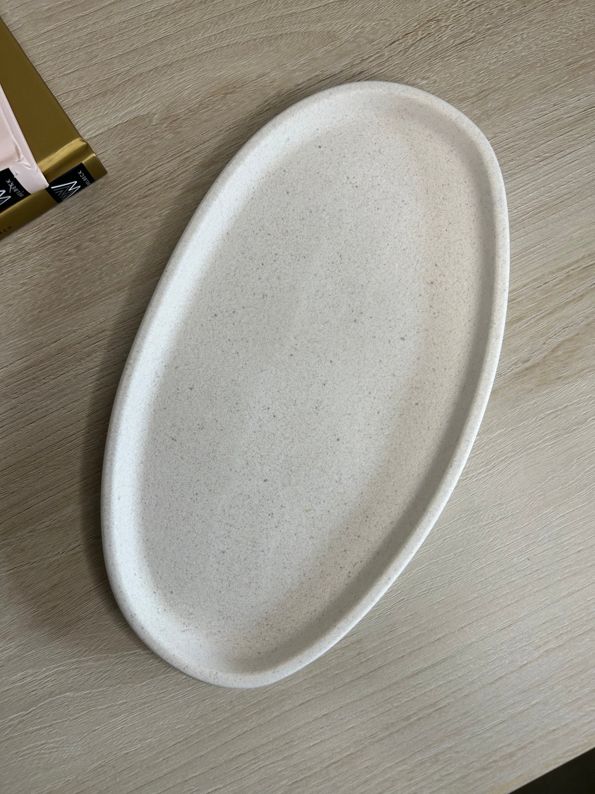 Handmade Home Accessories - a shot of the curve tray with nothing on to highlight the size and texture.