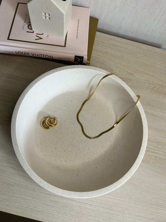 Handmade Home Accessories- a birds eye shot of a classic shape bowl in a  natural stone finish.