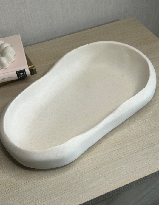 Handmade Home Accessories - A large irregular shaped bowl with chunky edges in a natural stone finish.