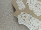 Handmade Home Accessories - a close up shot of the snap design showing of the detail of the terrazzo.