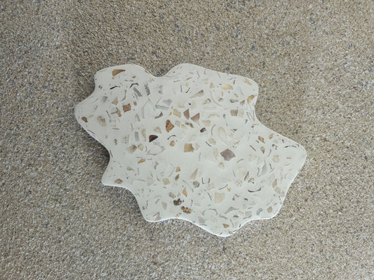 Handmade Home Accessories - A single Irregular shaped coaster, with a white base and real seashells creating a terrazzo design.