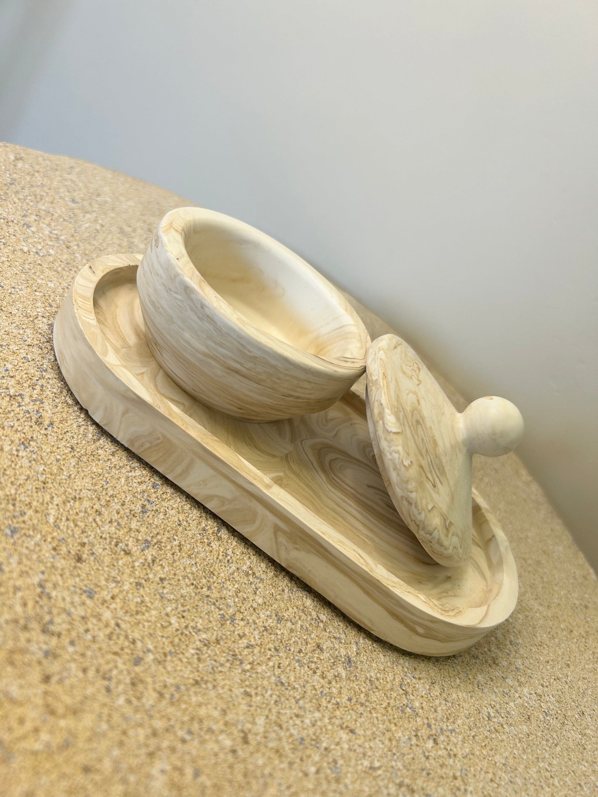 Handmade Home Accessories - a brown marble trinket pot on a brown marble trinket tray, with the lid resting on its side