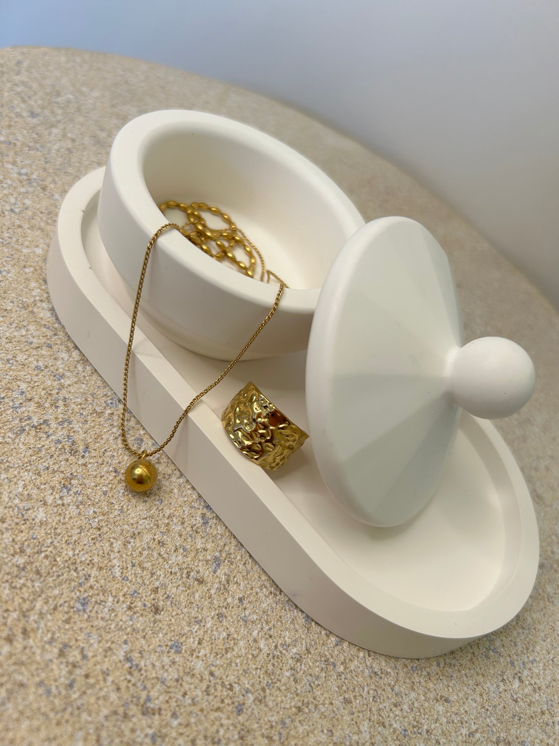 Handmade Home Accessories - a white trinket pot on a white trinket tray with a gold ring and necklace on