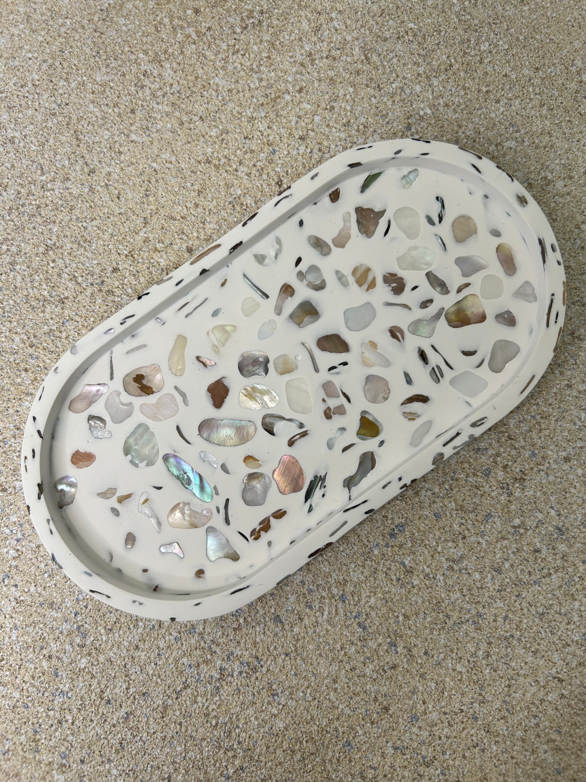 Handmade Home Accessories - an oval shaped white trinket tray with shiny shell and pebble details