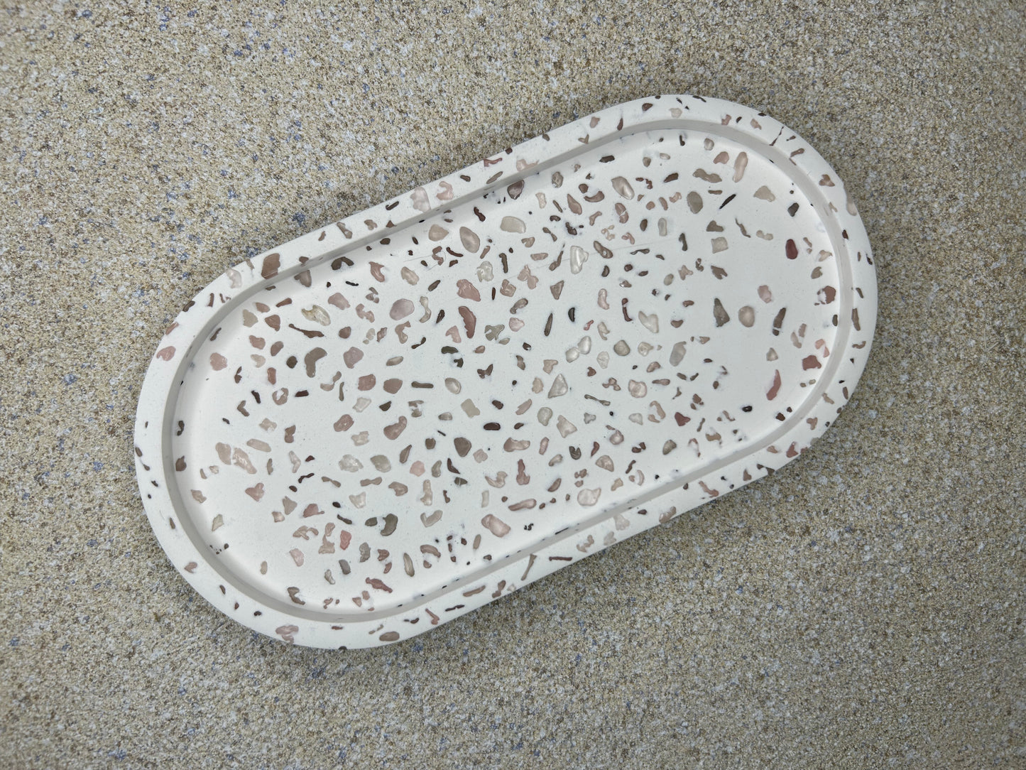 Handmade Home Accessories - A trinket tray from birds eye view with a terrazzo effect created using rose quartz