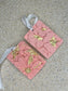 Handmade Homes Accessories - two pink aromatherapy floral stones with gold touches on white ribbons