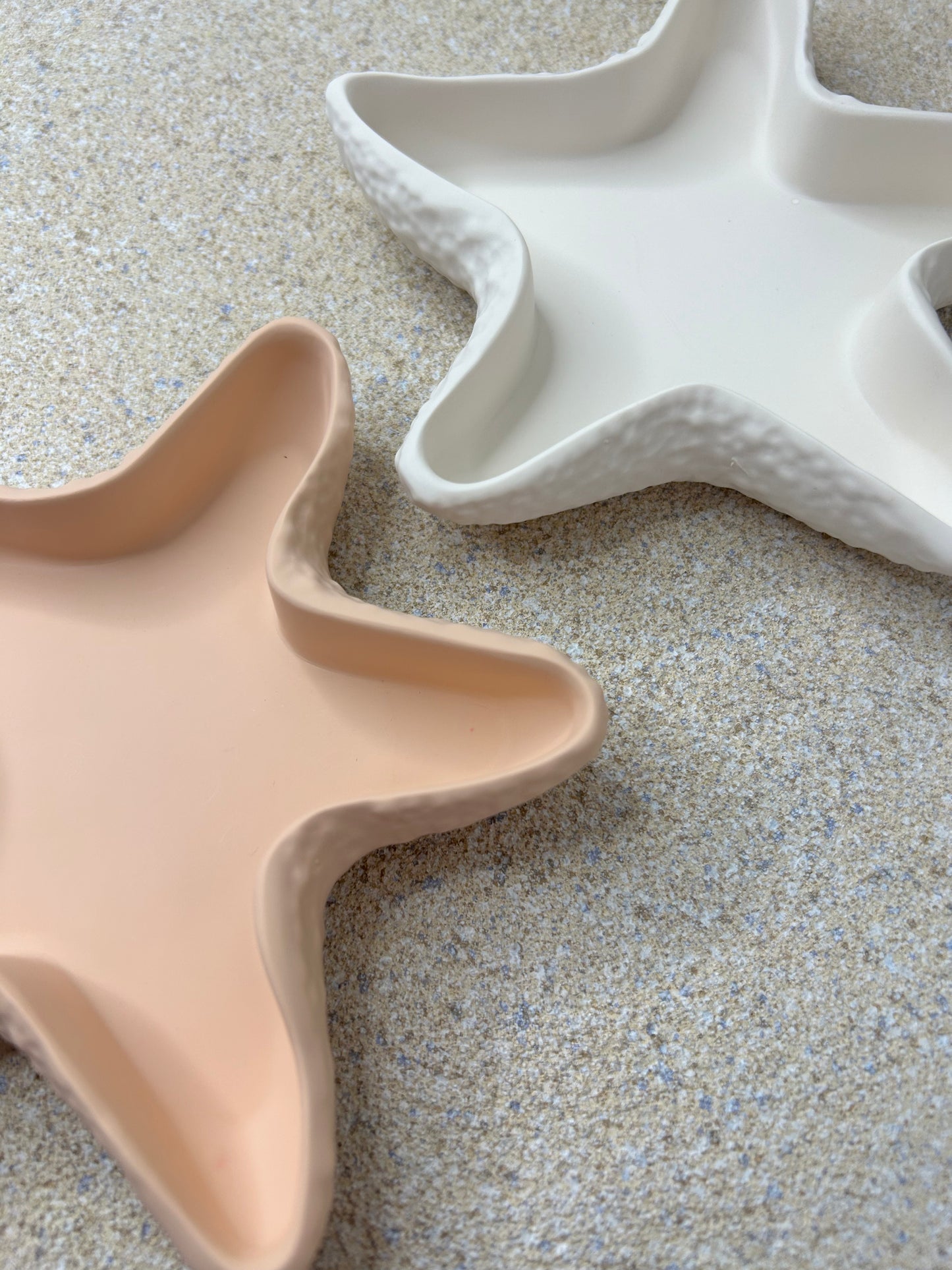 Handmade Home Accessories -  a close up shot of the edgeing of both the peach and white starfish trays