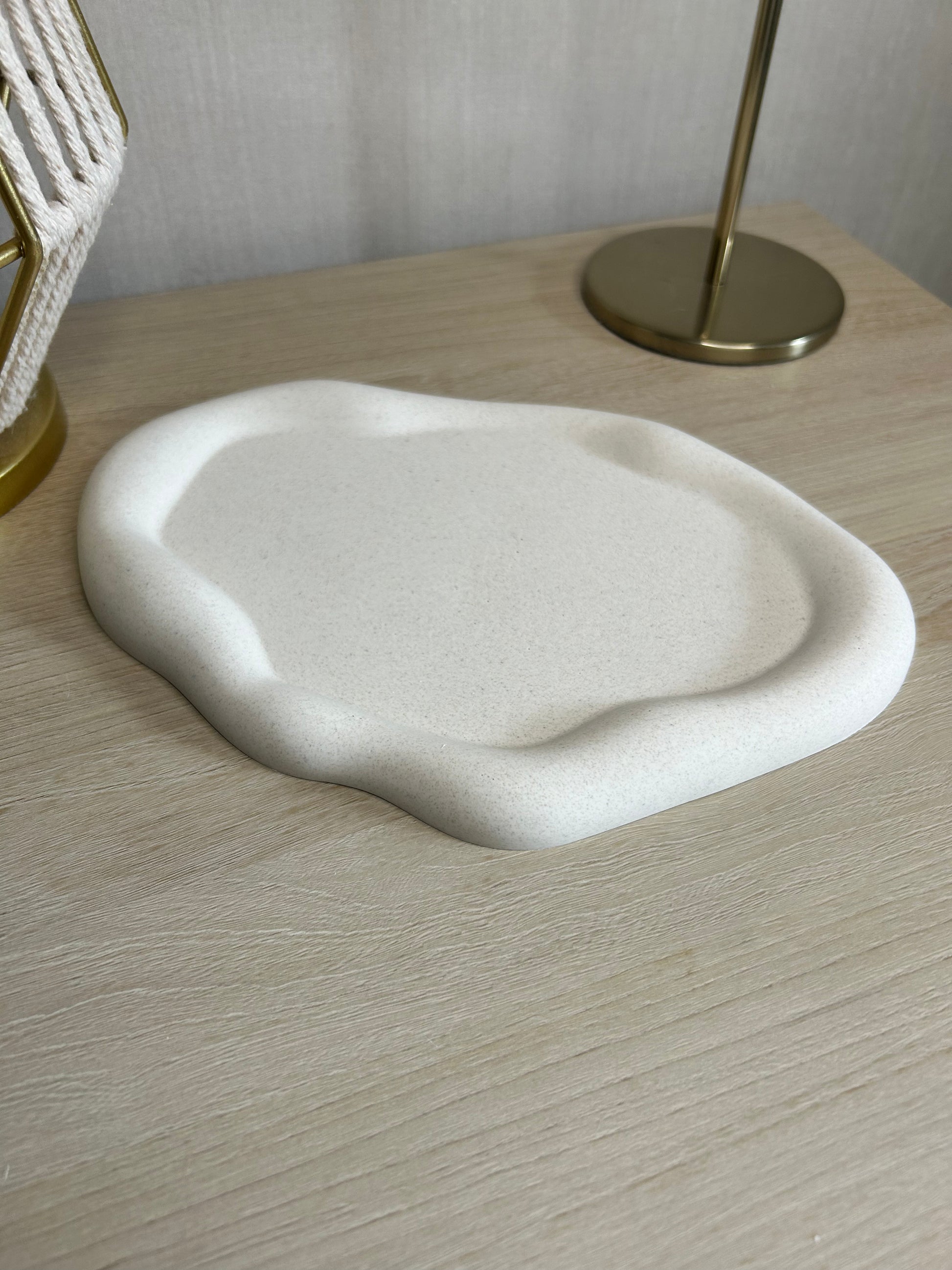 Handmade Home Accessories - an angled shot of the pebble trinket tray showing its depth