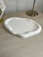 Handmade Home Accessories - an angled shot of the pebble trinket tray showing its depth