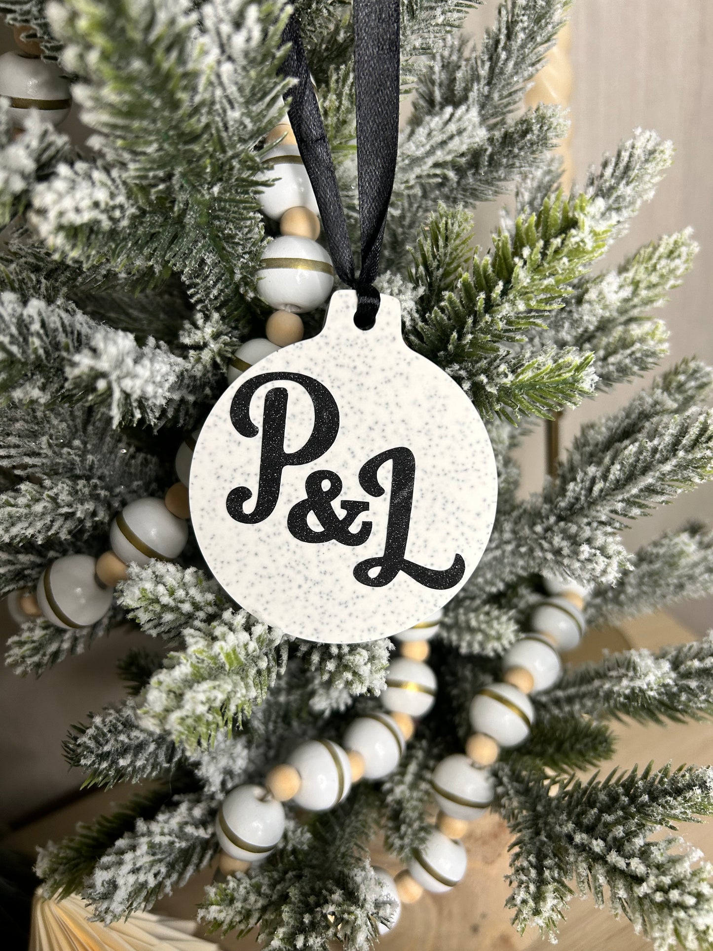 Handmade Christmas Decor - Sparkling initial hanging ornament with black P&L on.