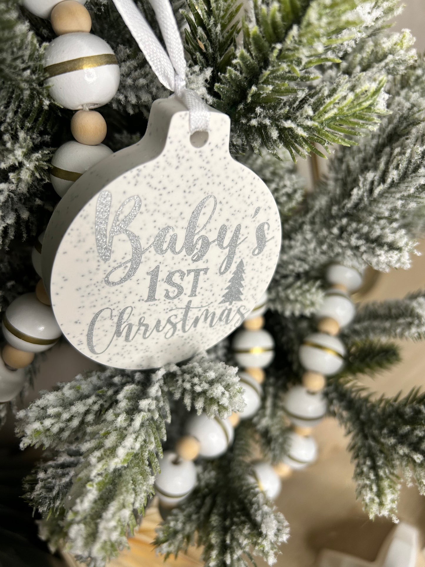 Handmade Christmas Decor - Baby's first Christmas ornament in silver shimmer writing.