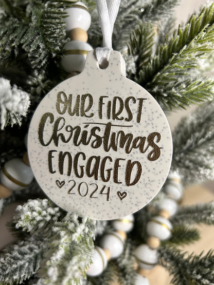 Handmade Christmas Decor - Our first christmas engaged bauble in gold sparkling writing.