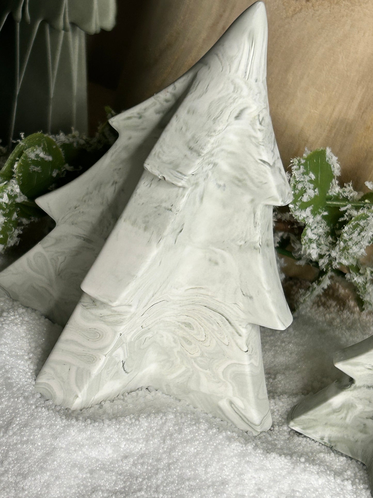 Handmade Home Accessories - A close up shot of a green marble Christmas tree ornament.