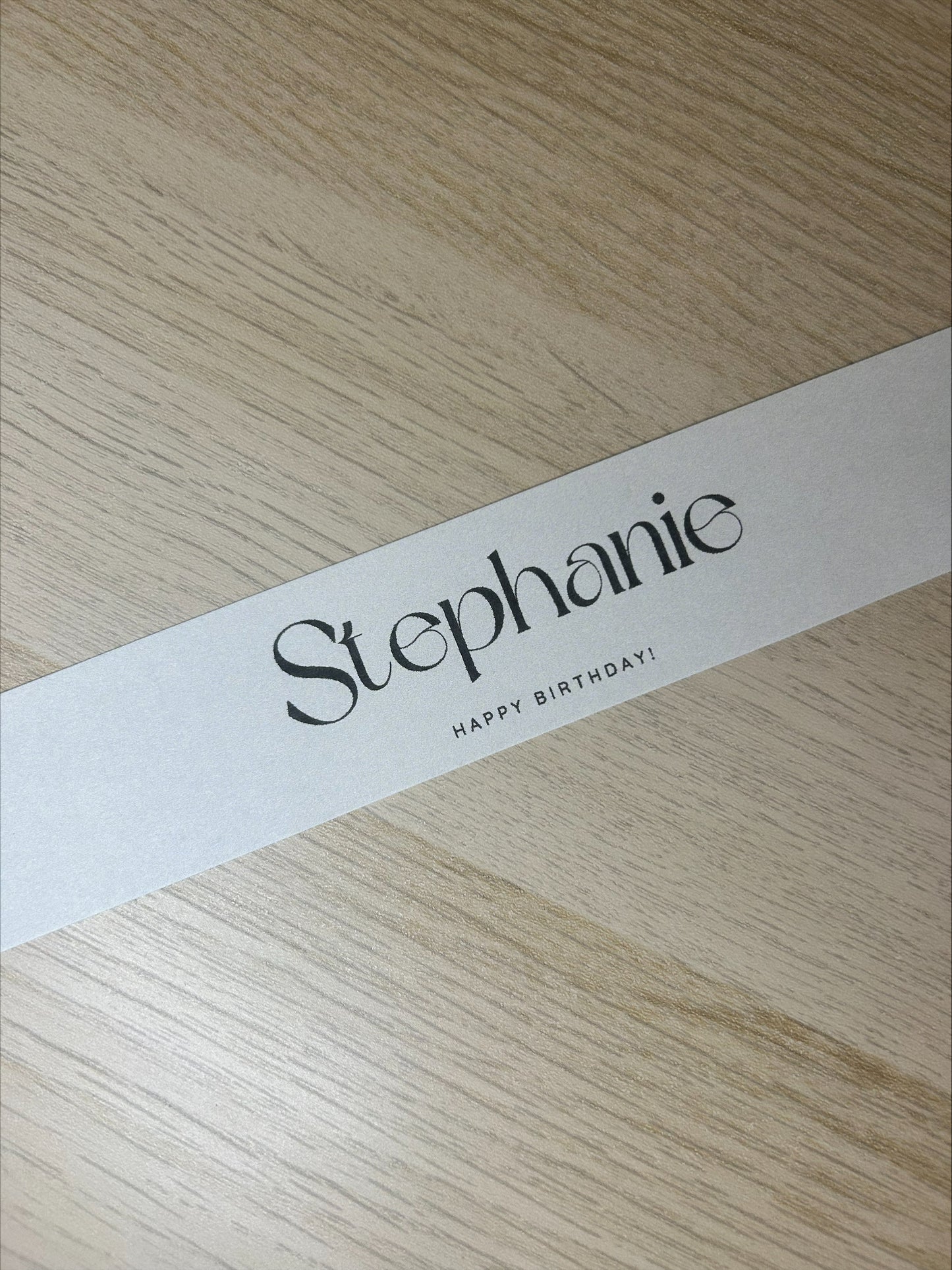 Handmade Home Accessories - a photo of a customised belly band that says Happy Birthday Stephanie, used to show how a personalised belly band will look on the product.