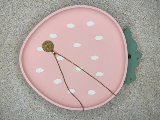 Handmade Homes Accessories -  a pink strawberry trinket tray with a gold coin necklace on