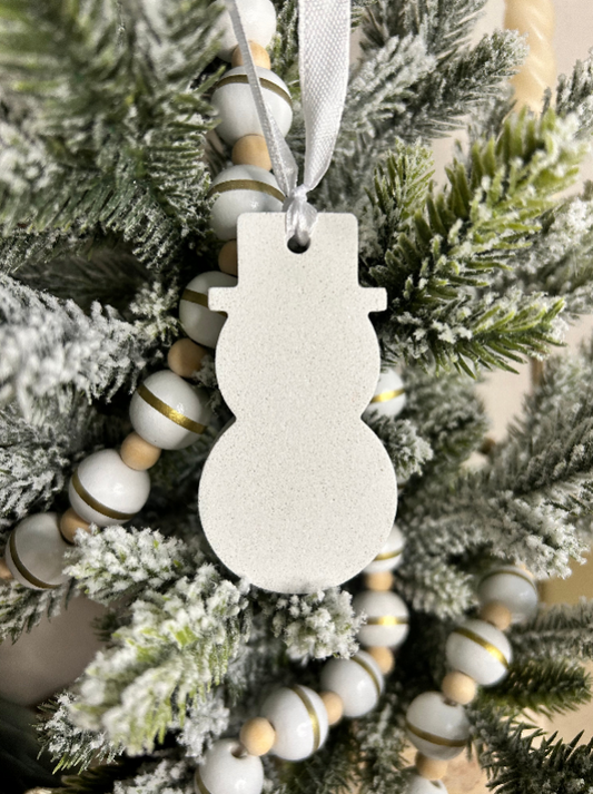 Handmade Home Accessories - A sparkling snowman christmas tree ornament hanging on a tree.