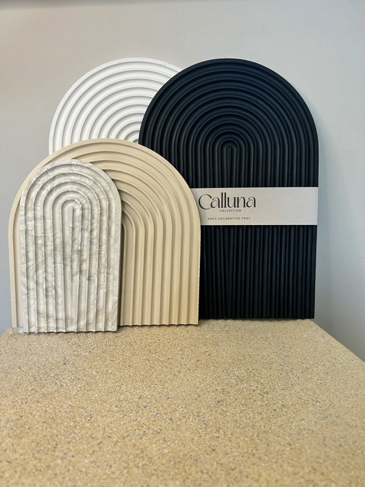 Handmade Home Accessories -an image of four arch decorative trays showing large, medium and small in black, white, beige and beige marble