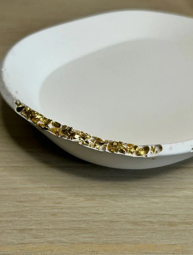 Handmade Home Accessories - A close up shot of the small oval trinket dish, showcasing the gold raw druzy edge design.