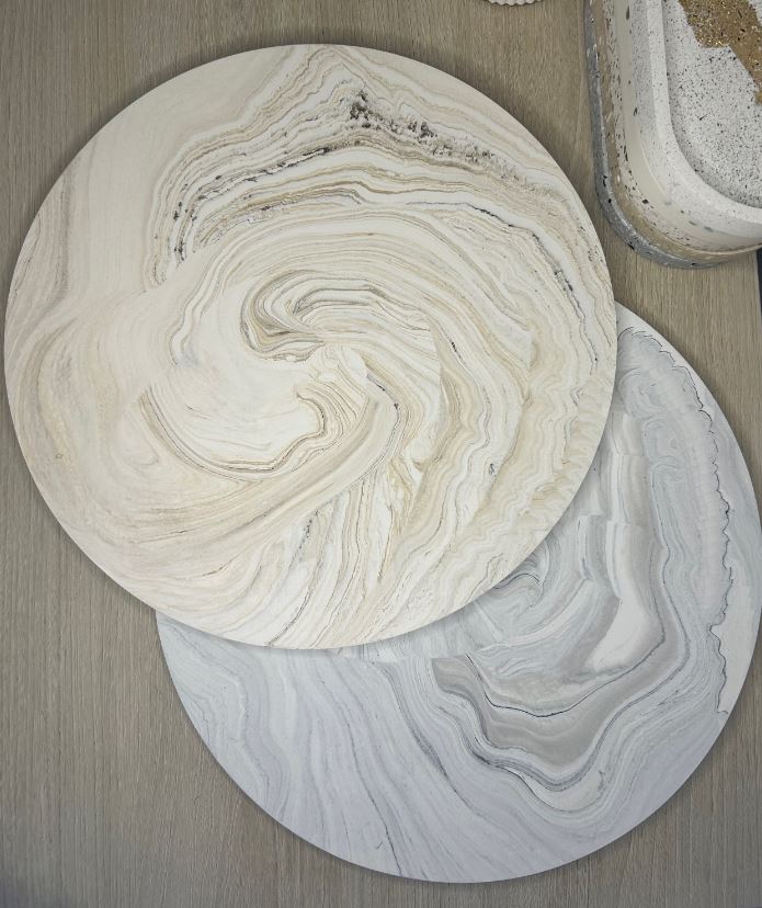 Handmade Home Accessories -a shot of the brown marble and the grey marble display plates taken from a birds eye view.