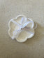 Handmade Home Accessories -  a single  brown marble flower candle dish with white ribbon around with a tag that says calluna