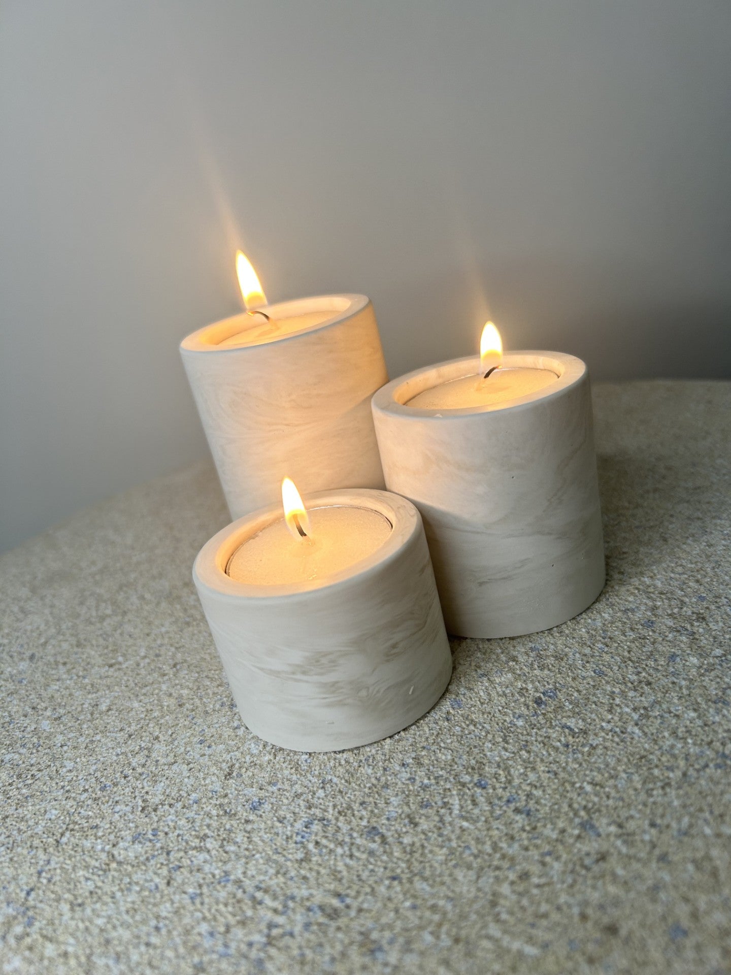 Handmade Home Accessories - A trio of griege marble candle holders at differing heights